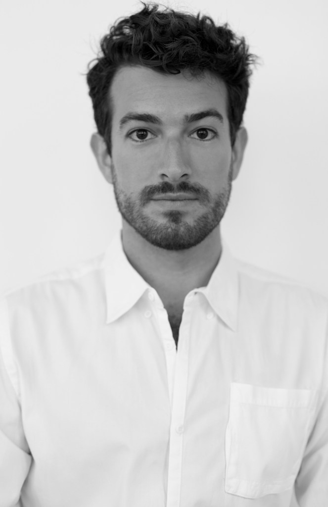 a portrait of Gabriel Ruas Santos Rocha wearing a white dress shirt